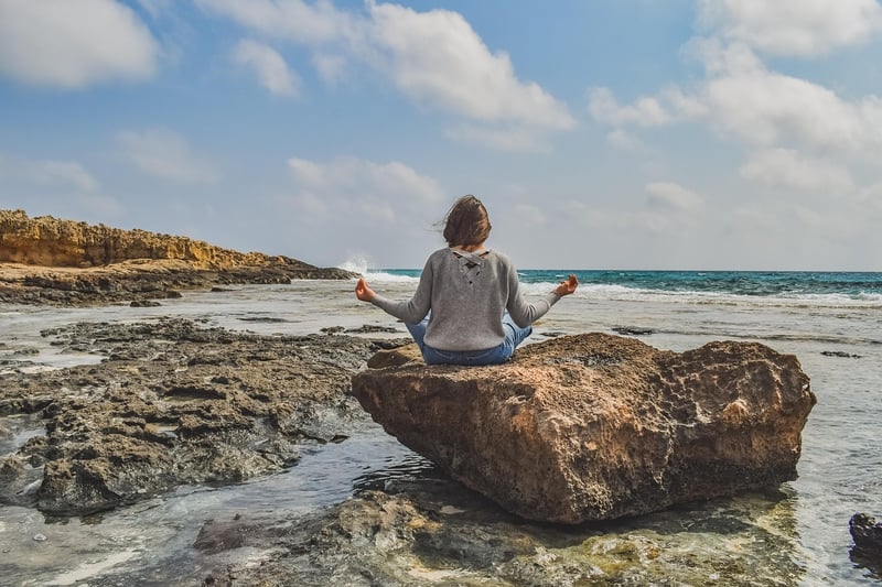Woman meditating in nature
